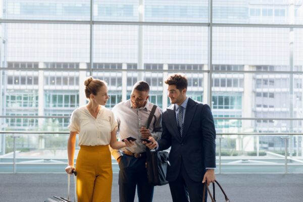 business travelers using technology