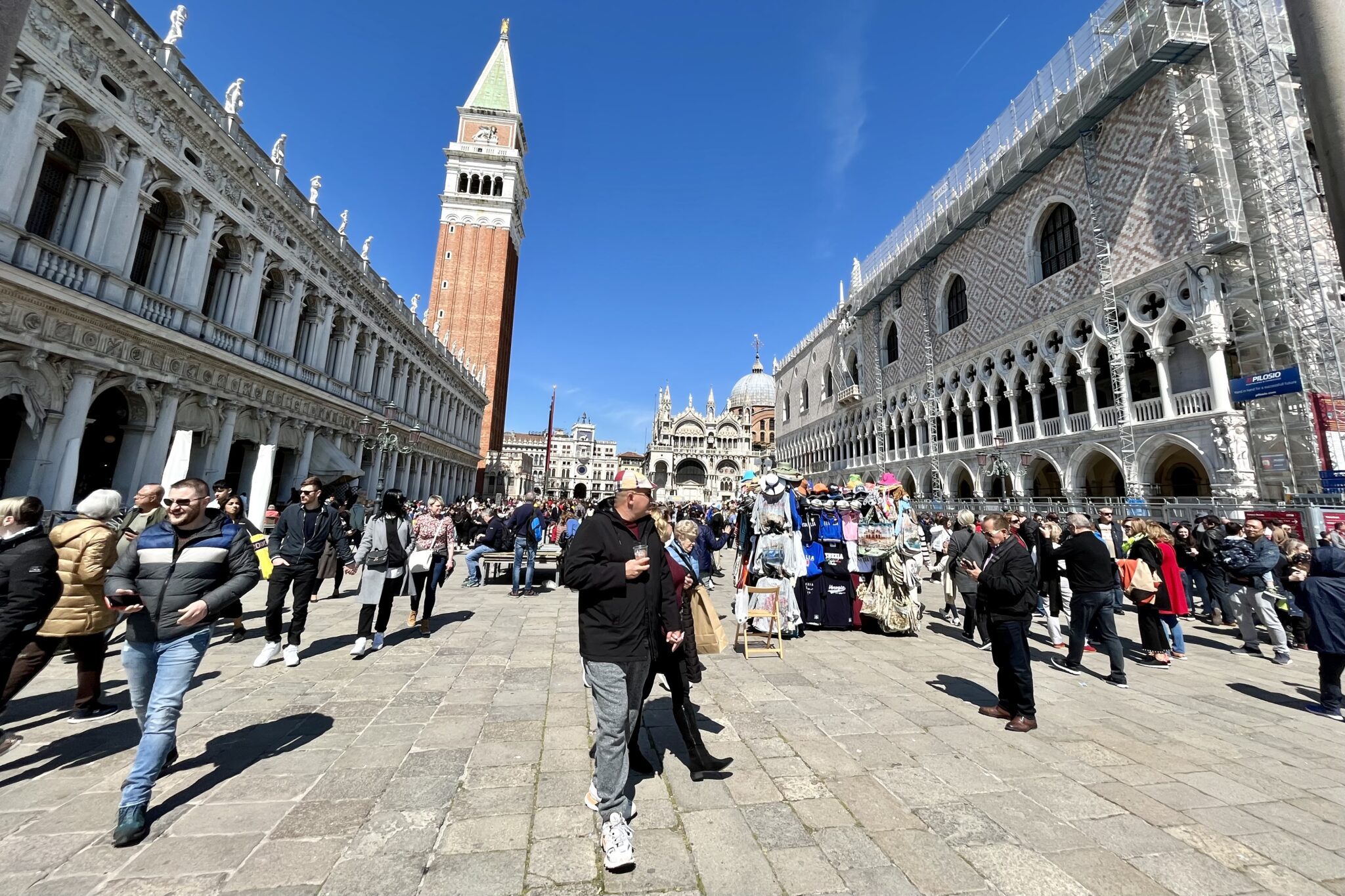 Tourists near St. Mark's Square in Venice, Italy.