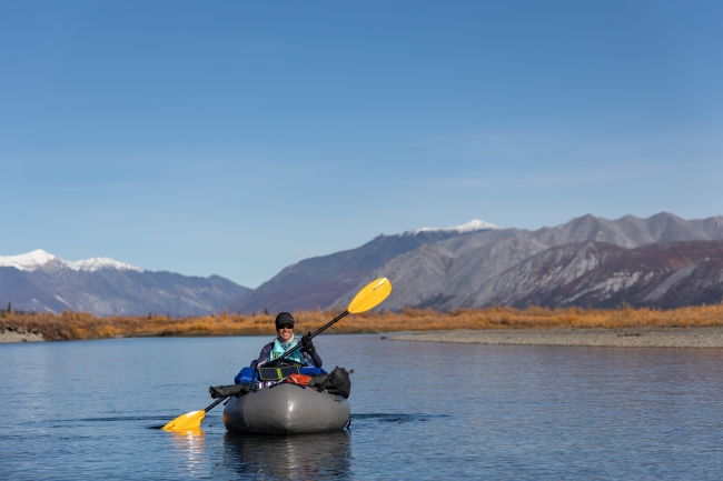 A paddler at a river in the Arctic National Wildlife Refuge, Alaska.